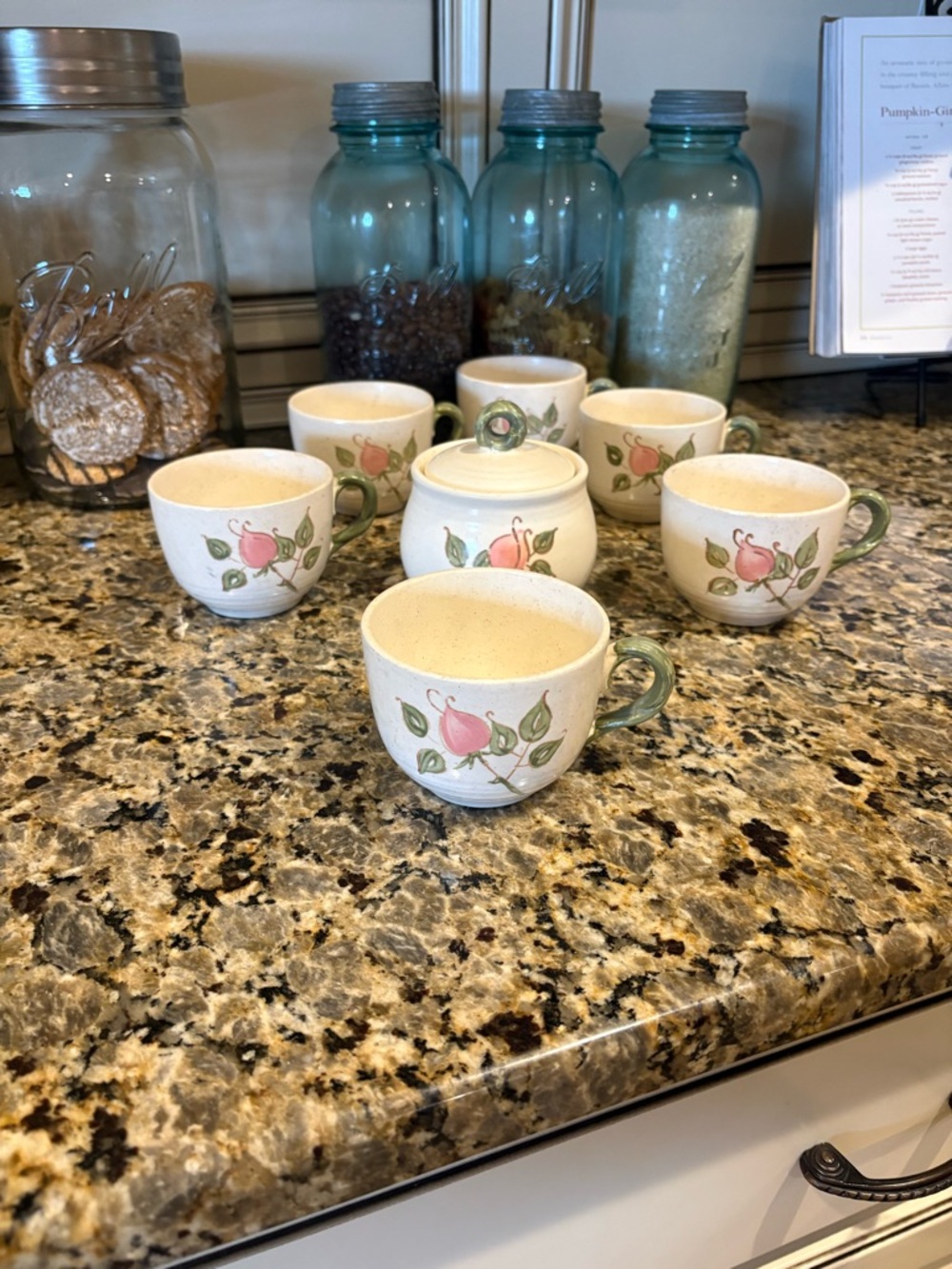 Stoneware Teacup Set with Pink Floral Design and Green Handles